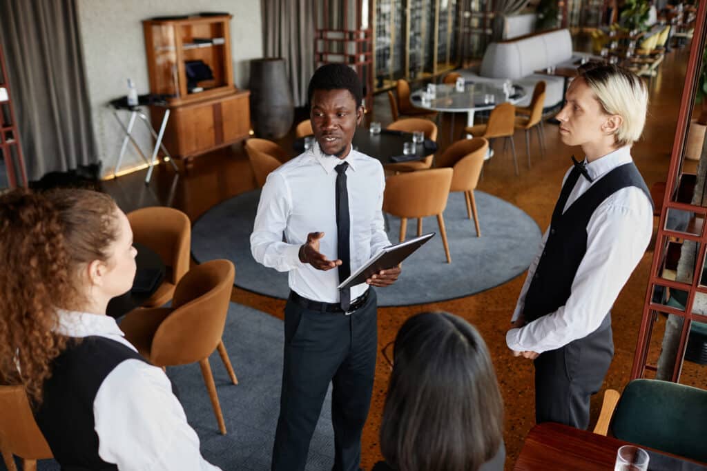 Restaurant pre-shift meeting.